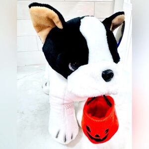 Stuffed Black and White Dog Carrying Trick or Treat Bag 🎃